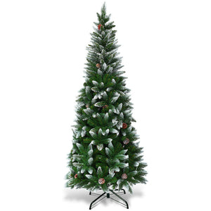 Decorated Christmas tree with snow and pinecones on a white background