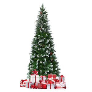 Decorated Christmas tree with presents on a white background