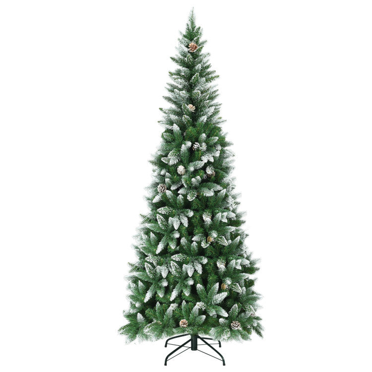 Festive Christmas tree with snow and pinecones on a white background