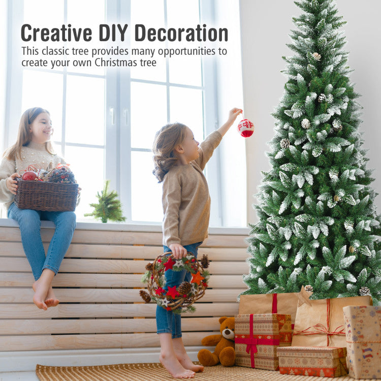 Two children decorating a Christmas tree with presents and a teddy bear on the floor.