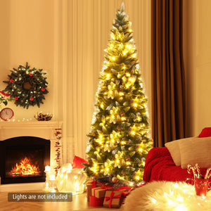 Decorated Christmas tree with lights in a living room setting.