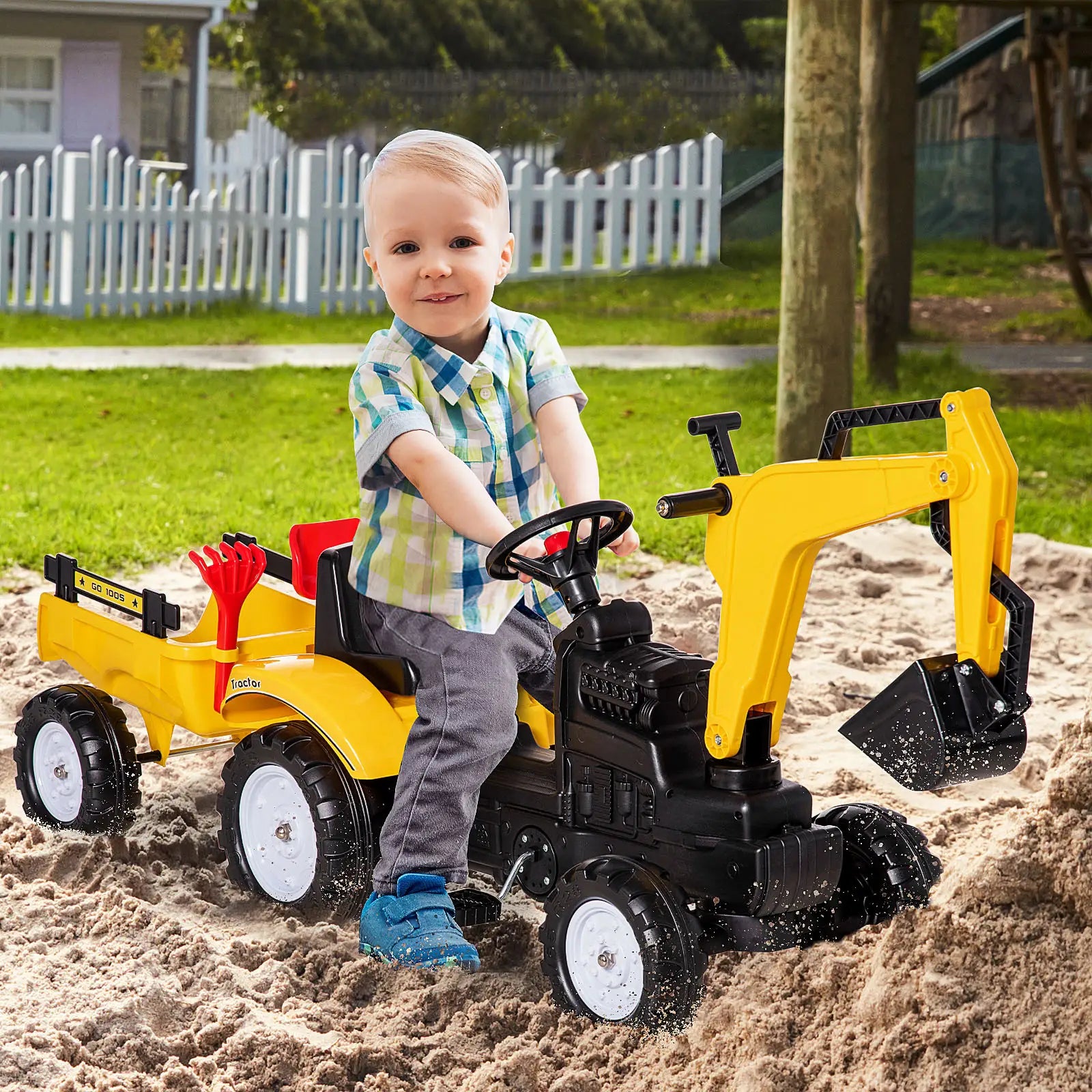 Pedal-powered excavator ride-on toy with detachable trailer