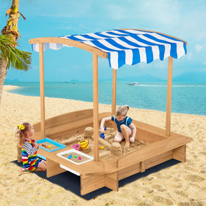 Canopy covered sandbox with striped fabric