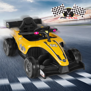 child-sitting-in-ride-on-formula-car