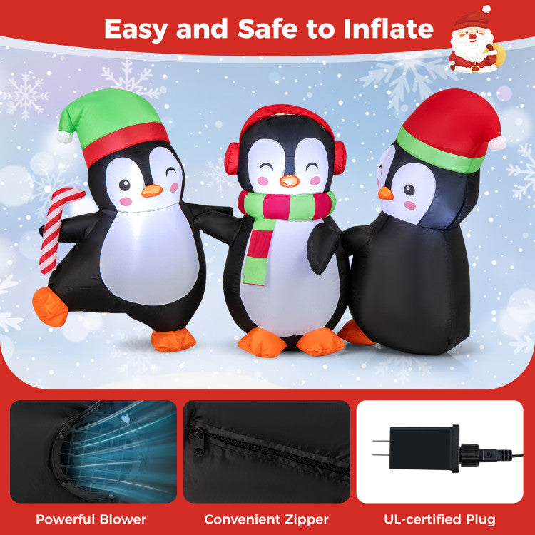 Glowing LED penguin family inflatable for festive holiday yard and lawn decoration