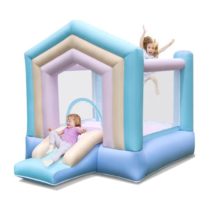 Parents watching kids through mesh walls of outdoor inflatable bounce house