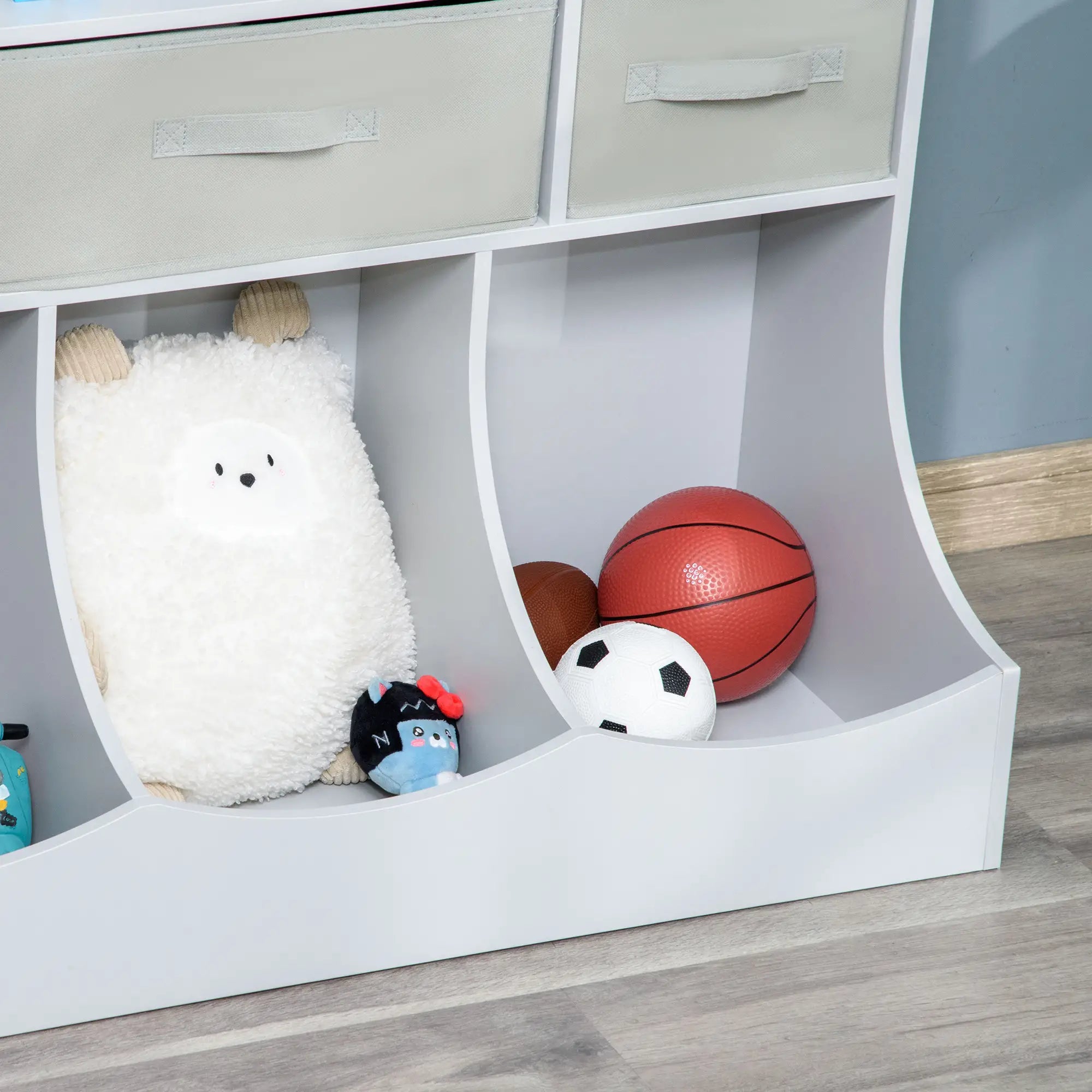MDF toy storage unit with fabric drawers and cubby shelves