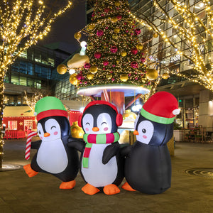Outdoor blow up penguins family Christmas decoration for lawn or garden display