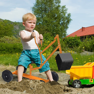 Treated wood sandbox with construction digger