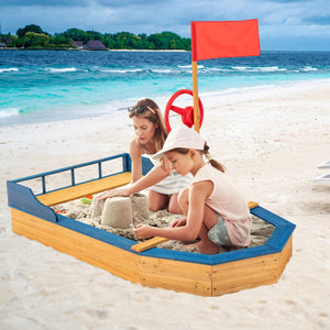 Sandbox with rake and sand tools for kids
