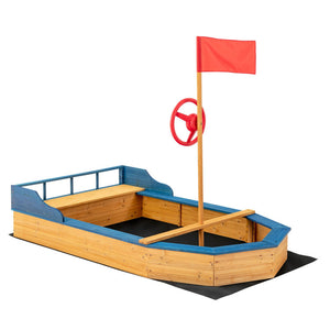 Sandbox with shovel and storage bench