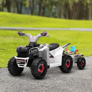 Children's toy ATV with a trailer carrying toys on a gravel path with grass and trees in the background.