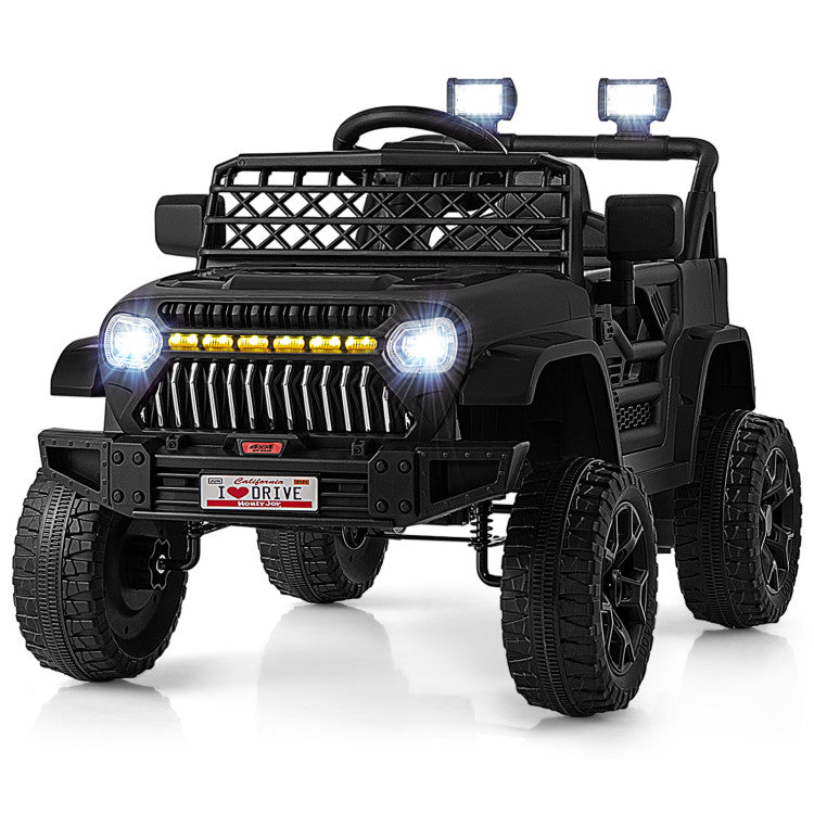 Black toy jeep with lights on a white background