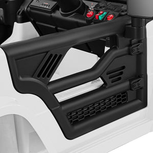 Close-up of a black protective guard on a vehicle, likely an off-road vehicle, with visible controls in the background.