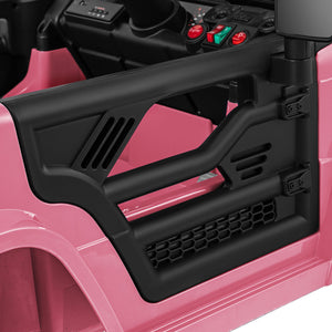 Close-up of a pink toy car with black interior and control panel.