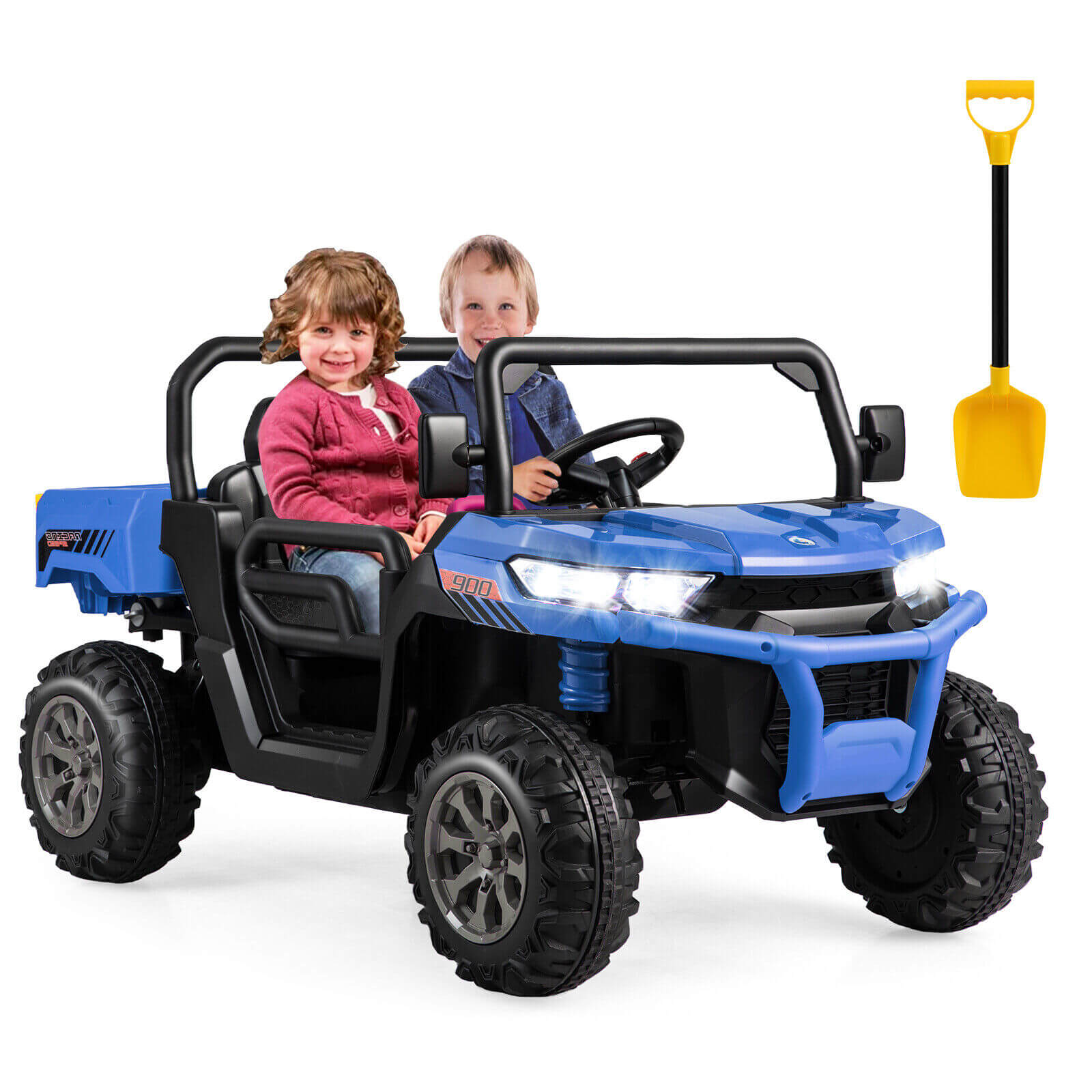 Children playing in a blue toy off-road vehicle with a yellow shovel on a white background