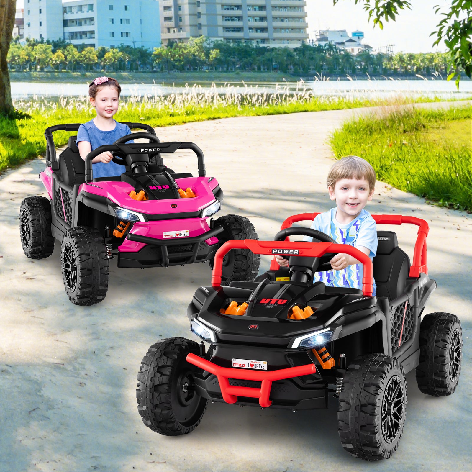 Two children playing with pink and red toy cars on a path by a lake.
