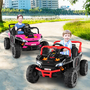 Two children playing with pink and red toy cars on a path by a lake.