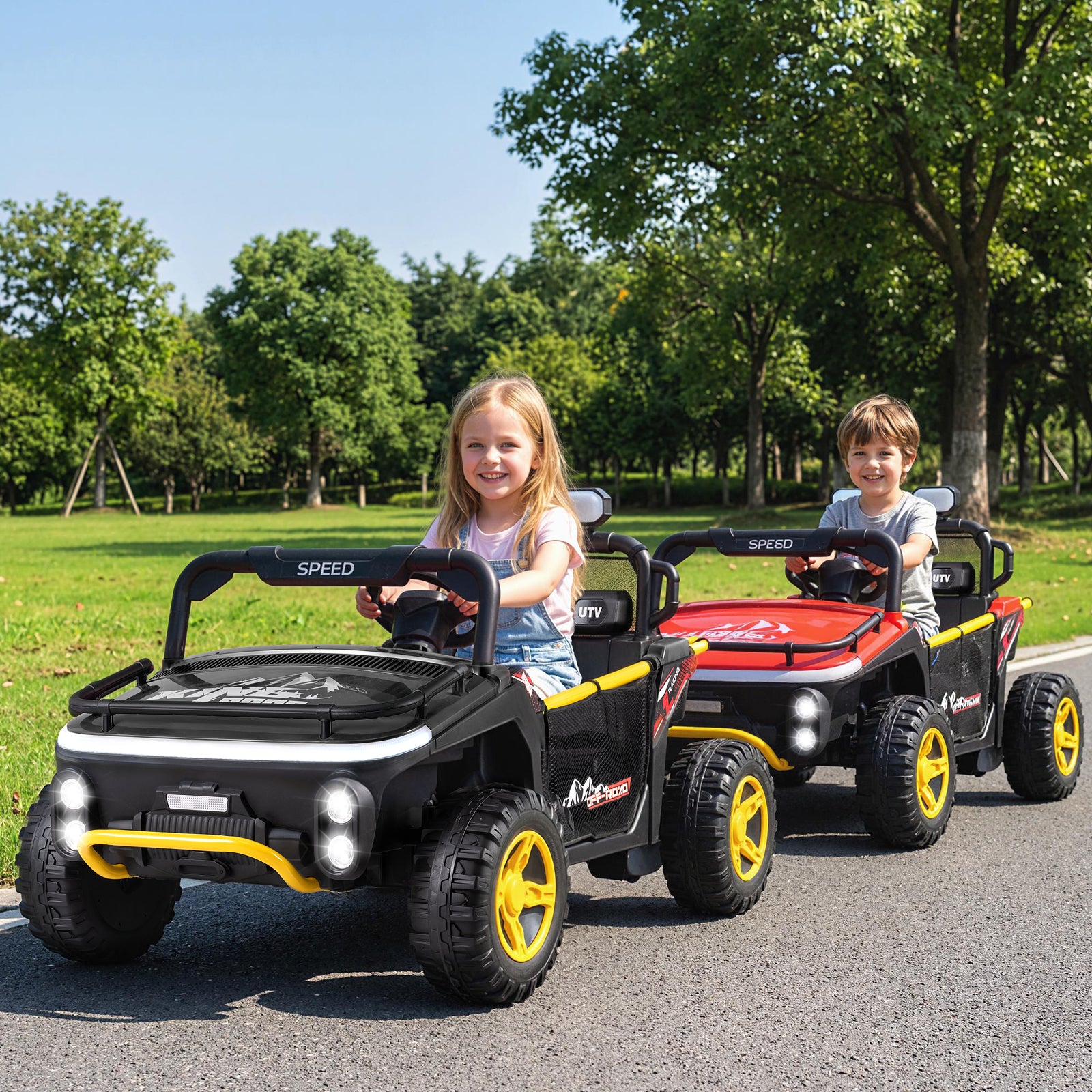 Two children playing with toy cars on a road in a park.