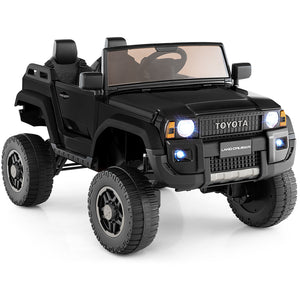 Black toy Toyota Land Cruiser on a white background