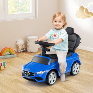 Child playing with a blue toy car in a room with toys and a window.