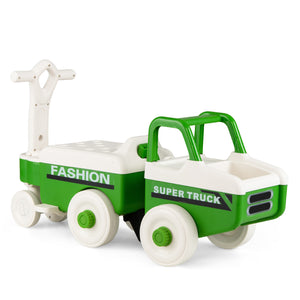 Green and white toy truck with a trailer on a white background