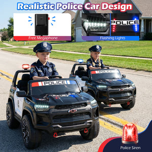 Two children in toy police cars with lights and sirens on a residential street.