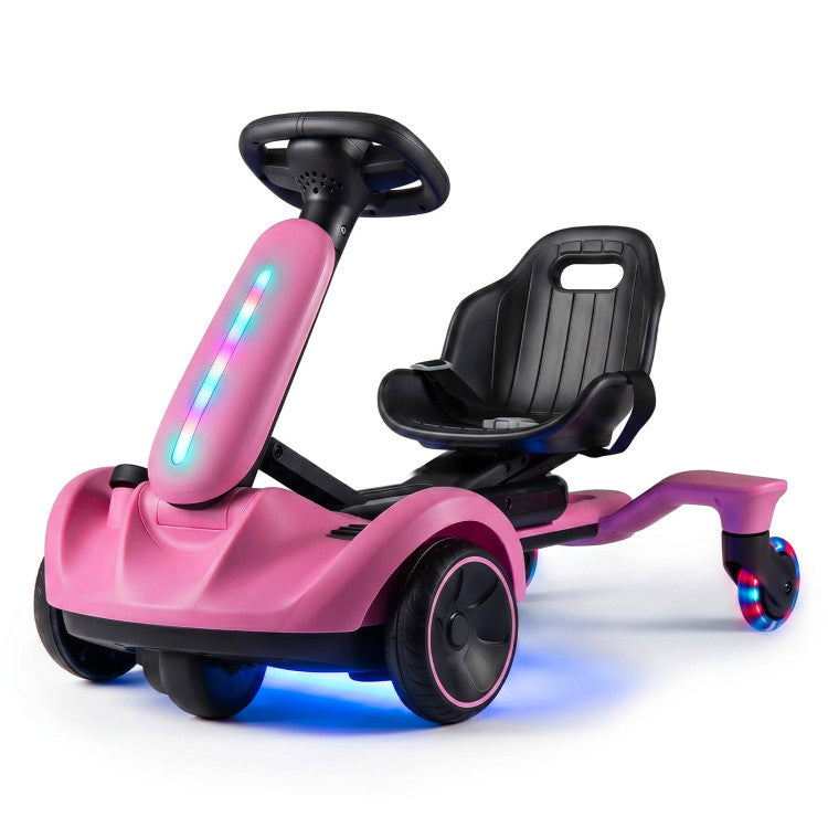 Pink toy car with a seat and colorful lights on a white background