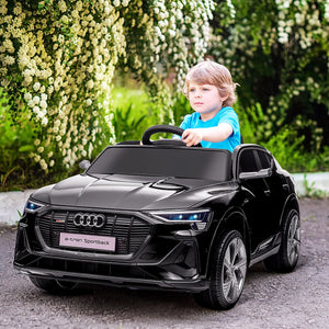 Child riding licensed Audi ride-on car similar to barbie in jeep toys