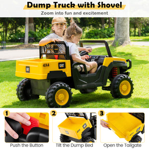 Children playing with a toy dump truck with shovel in a park setting