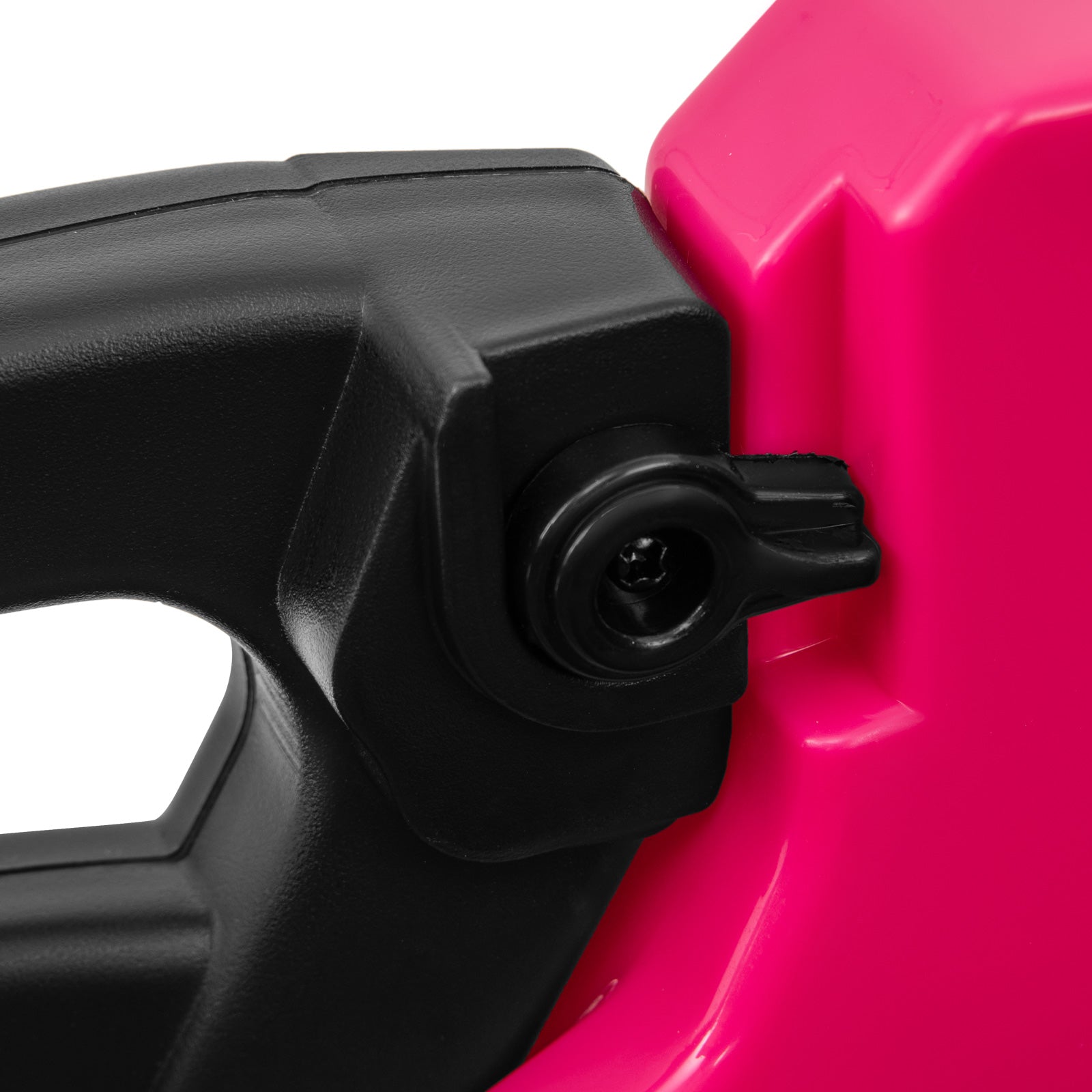 Close-up of a black nozzle on a pink fuel container