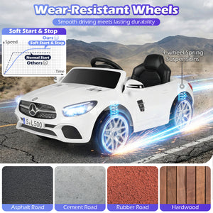 White toy car with Mercedes-Benz logo on a road with mountainous background
