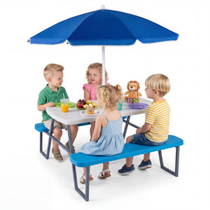 Children sitting at a table with a blue umbrella and bench on a white background