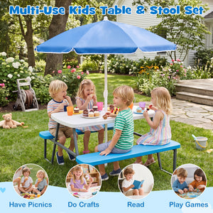 Children sitting at a blue kids table and stool set with a blue umbrella in a garden.