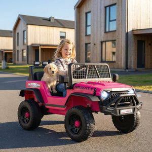 Child and dog in a pink toy jeep on a residential street