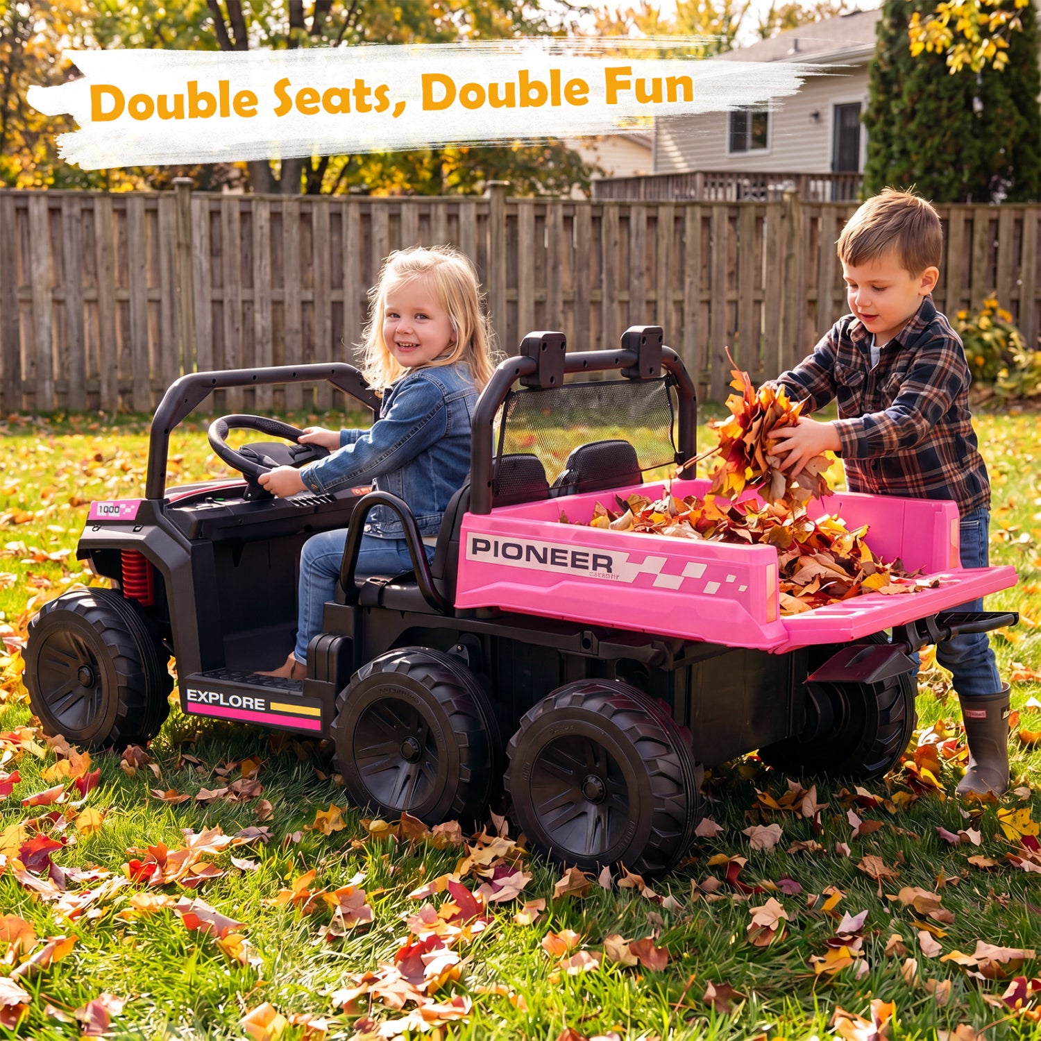 Two children playing with a toy truck in a backyard during autumn.