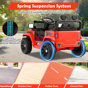 Red toy jeep with blue wheels on a road surface, highlighting spring suspension system.