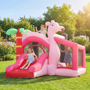 Pink inflatable flamingo play structure with slide and children playing in a garden.