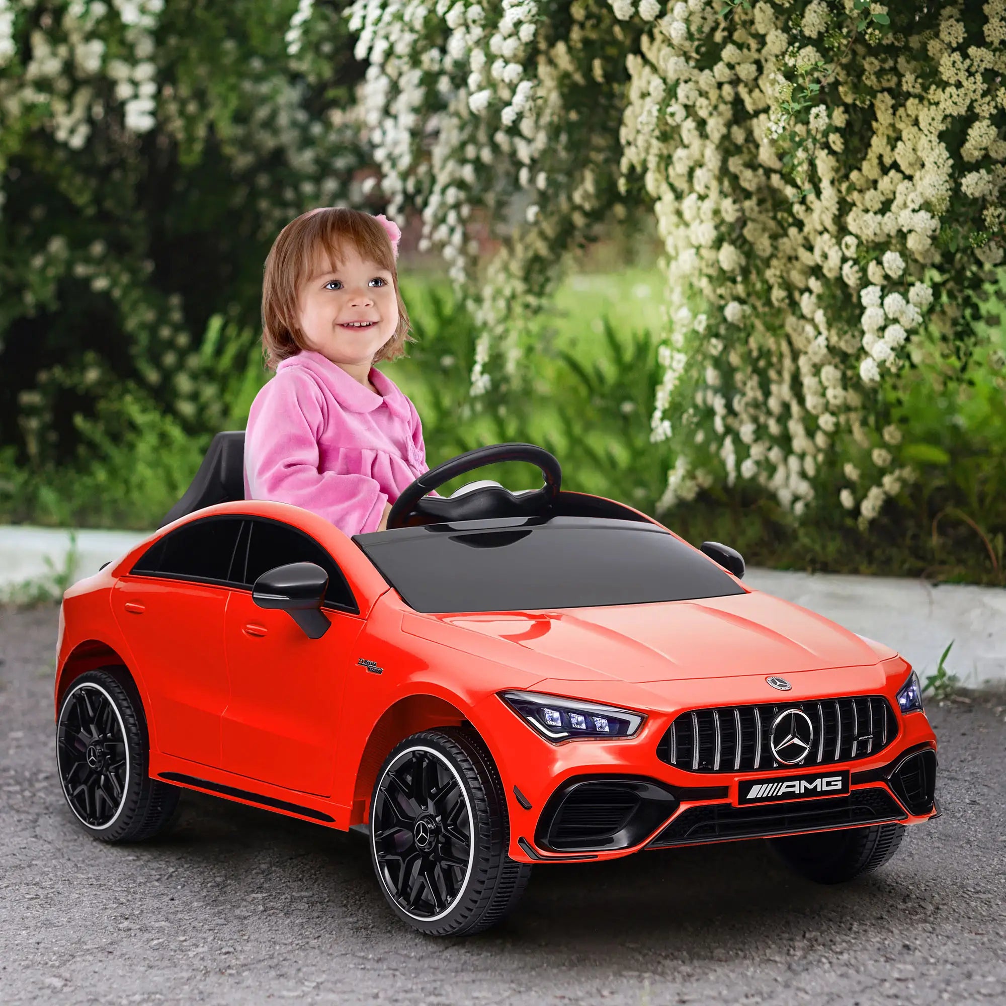Front angled view of red Mercedes AMG kids ride-on car.