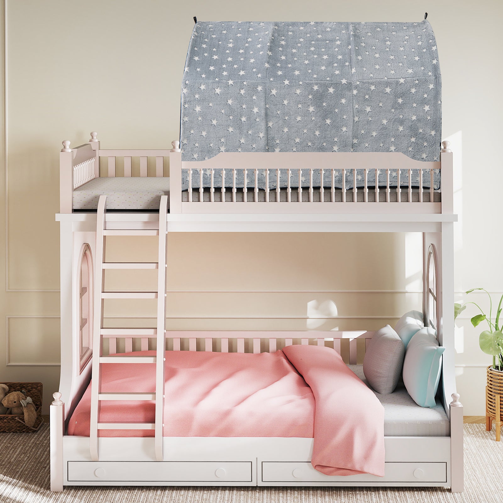 White children's bunk bed with pink bedding and star-patterned canopy in a room.