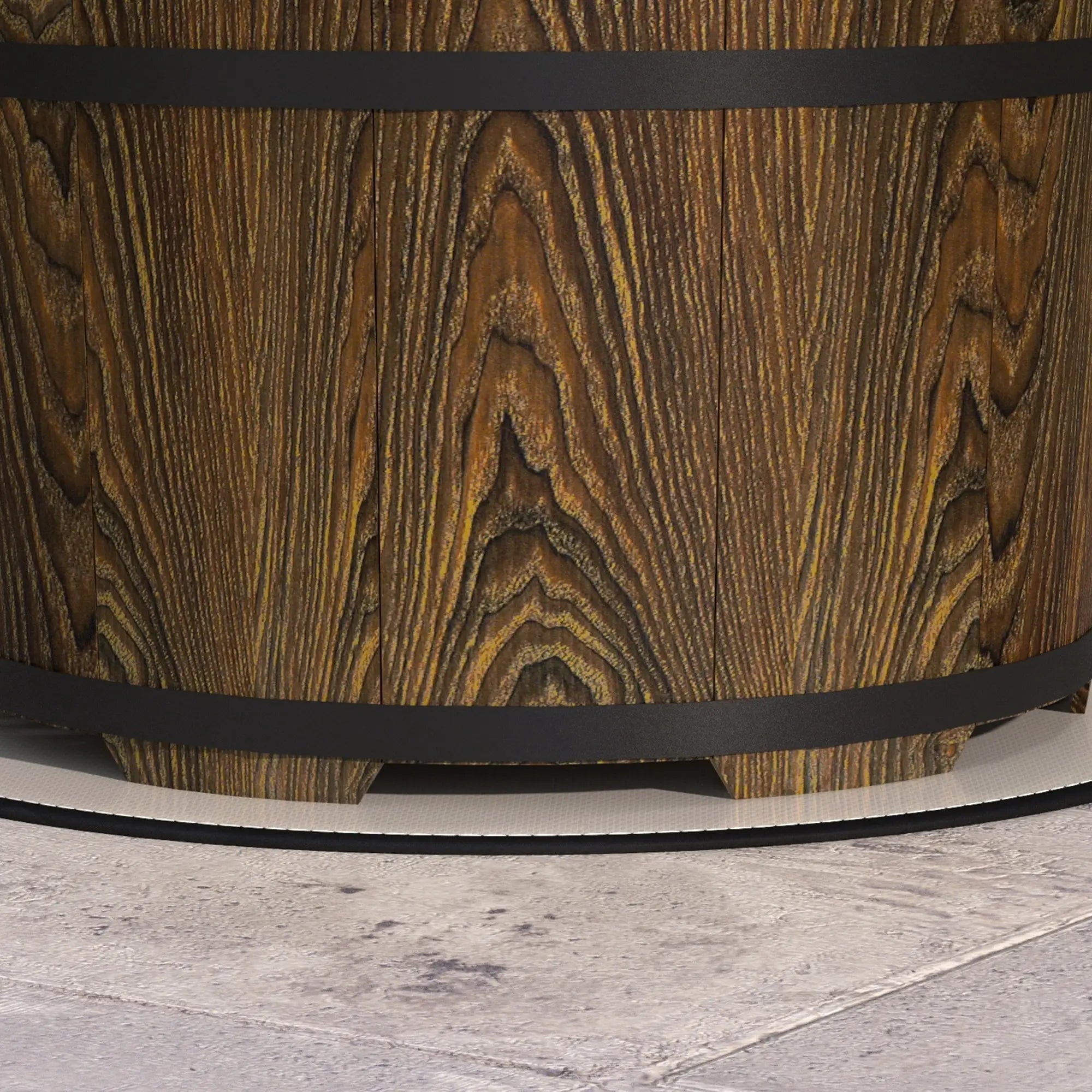 Wooden barrel with a black band on a light gray surface