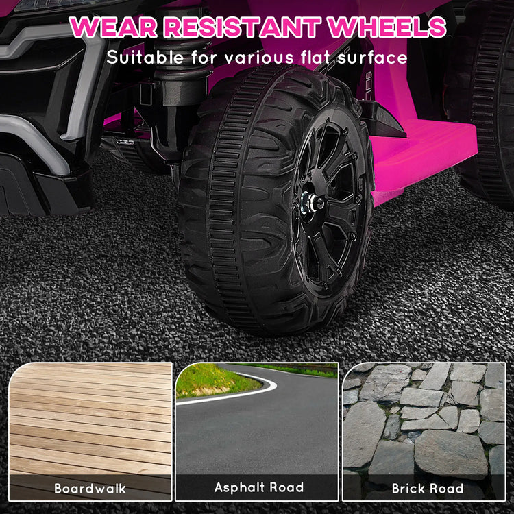 Close-up of a toy car wheel with wear-resistant tires, shown on a textured surface.