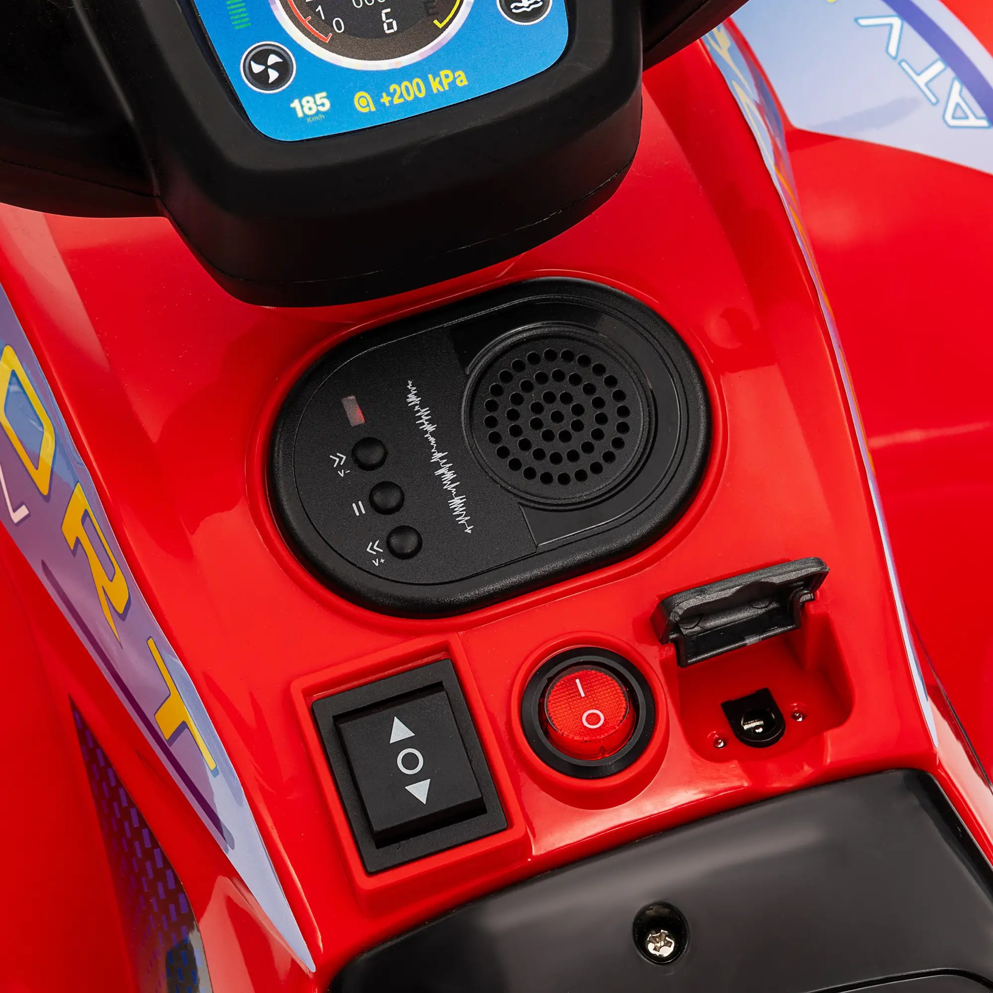 Close-up of a red vehicle's control panel with buttons and a display.