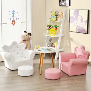 Children's playroom with white and pink chairs, ottomans, and toys on a shelf.