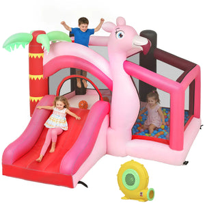 Children playing on a pink inflatable play structure with slide and ball pit.