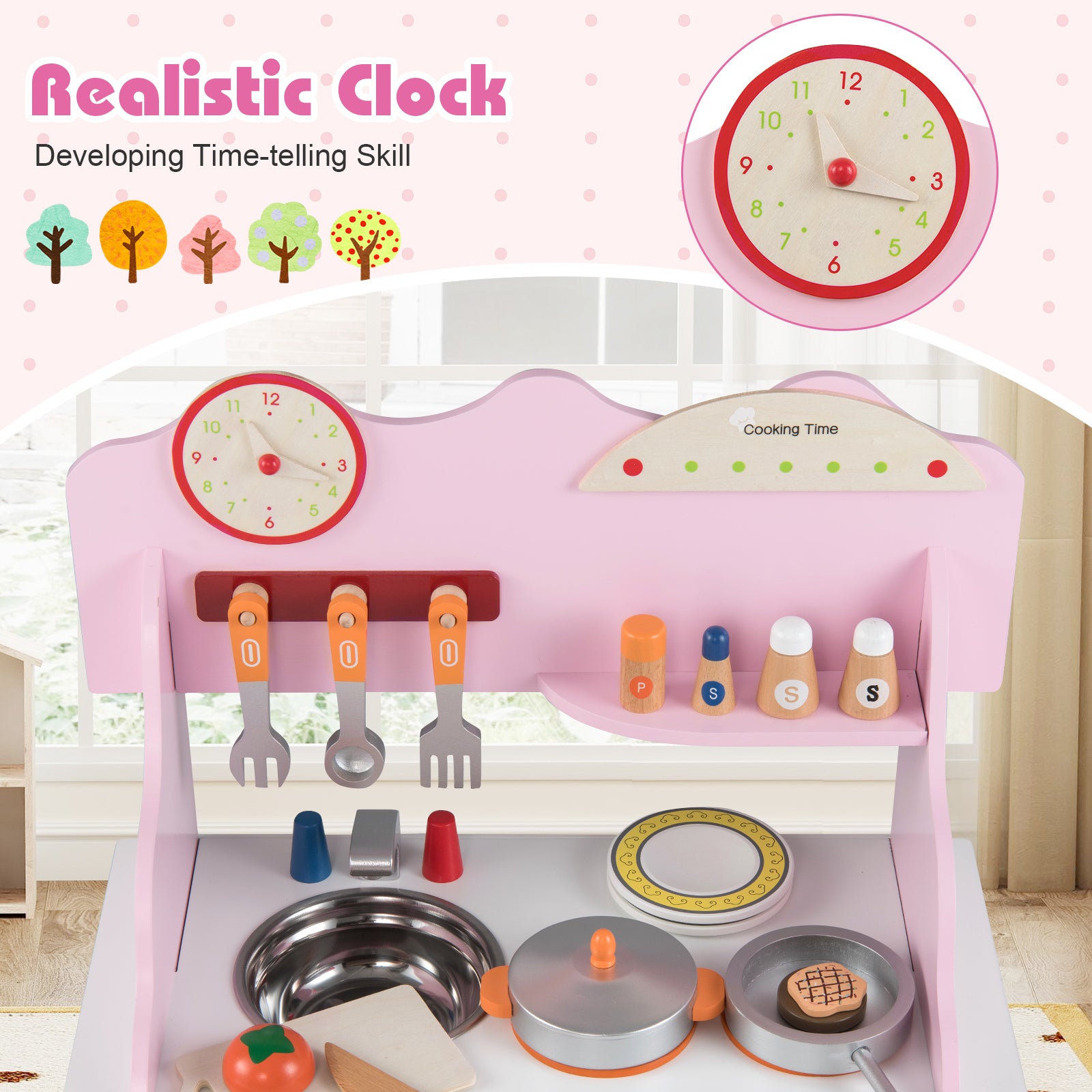 Children's play kitchen set with toy clock, utensils, and cookware on a pink stand.