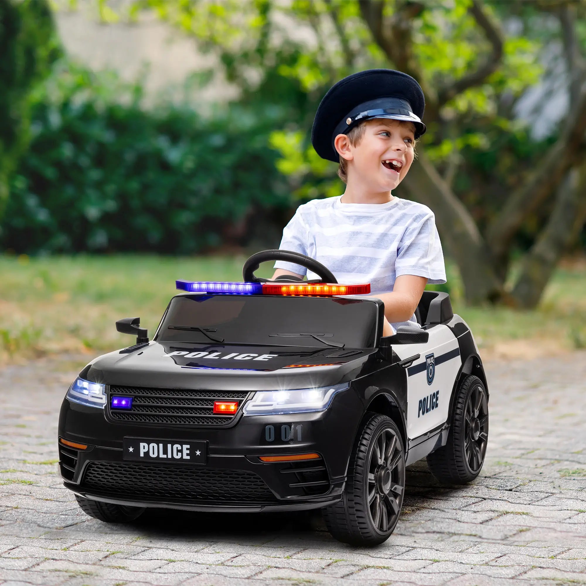 Child riding Freddo police UTV style electric car