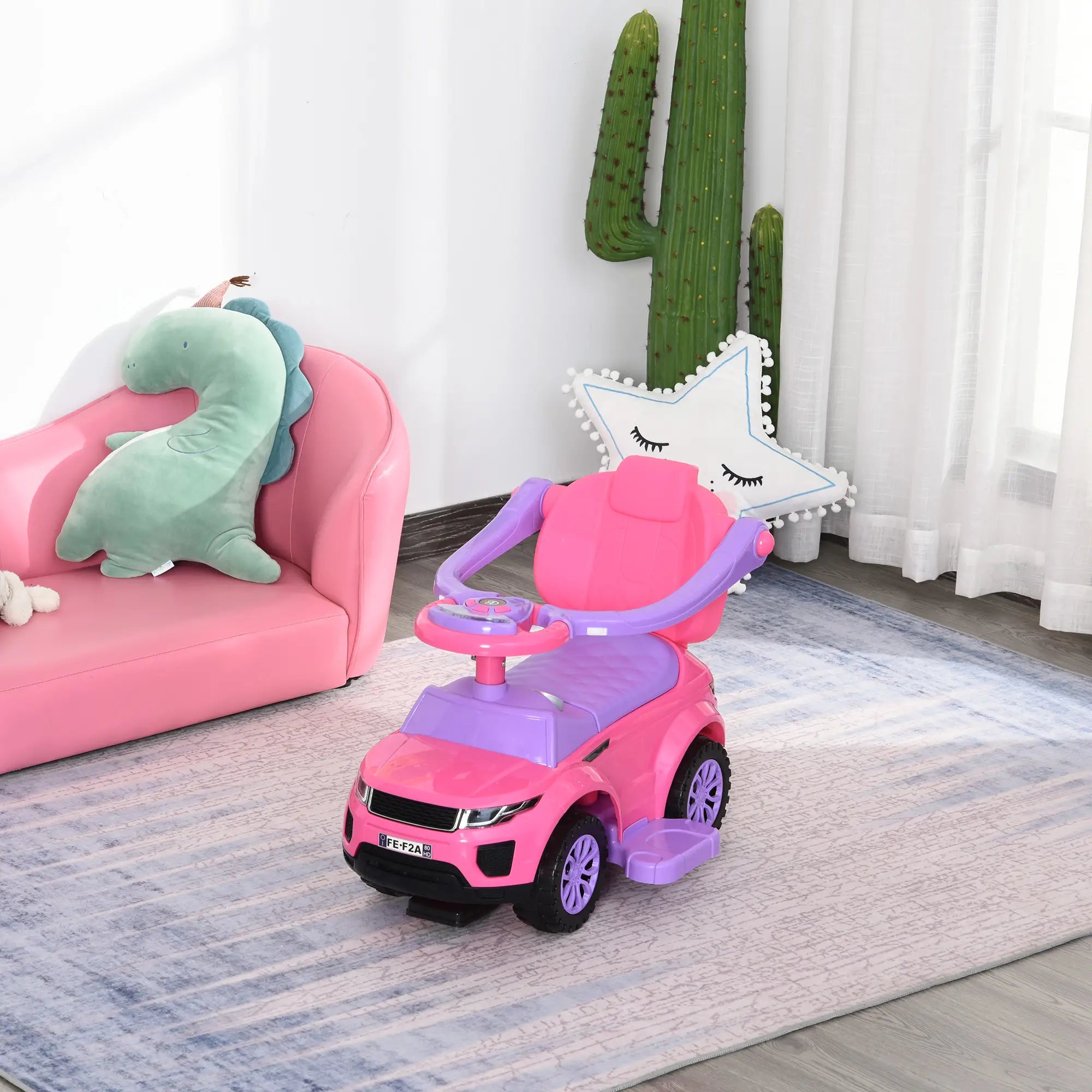arent-controlled push handle on toddler ride-on car