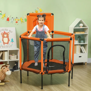 Child on a small orange trampoline in a room with green walls and shelves.