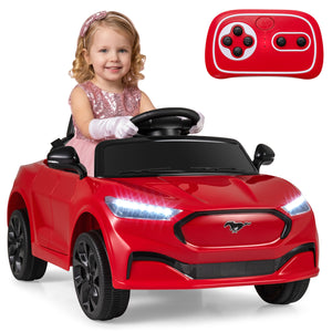 Red toy car with a child sitting inside and a remote control on a white background
